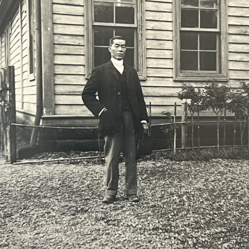 Photo of Japanese tour guide named Takenouchi Inscribed on rear